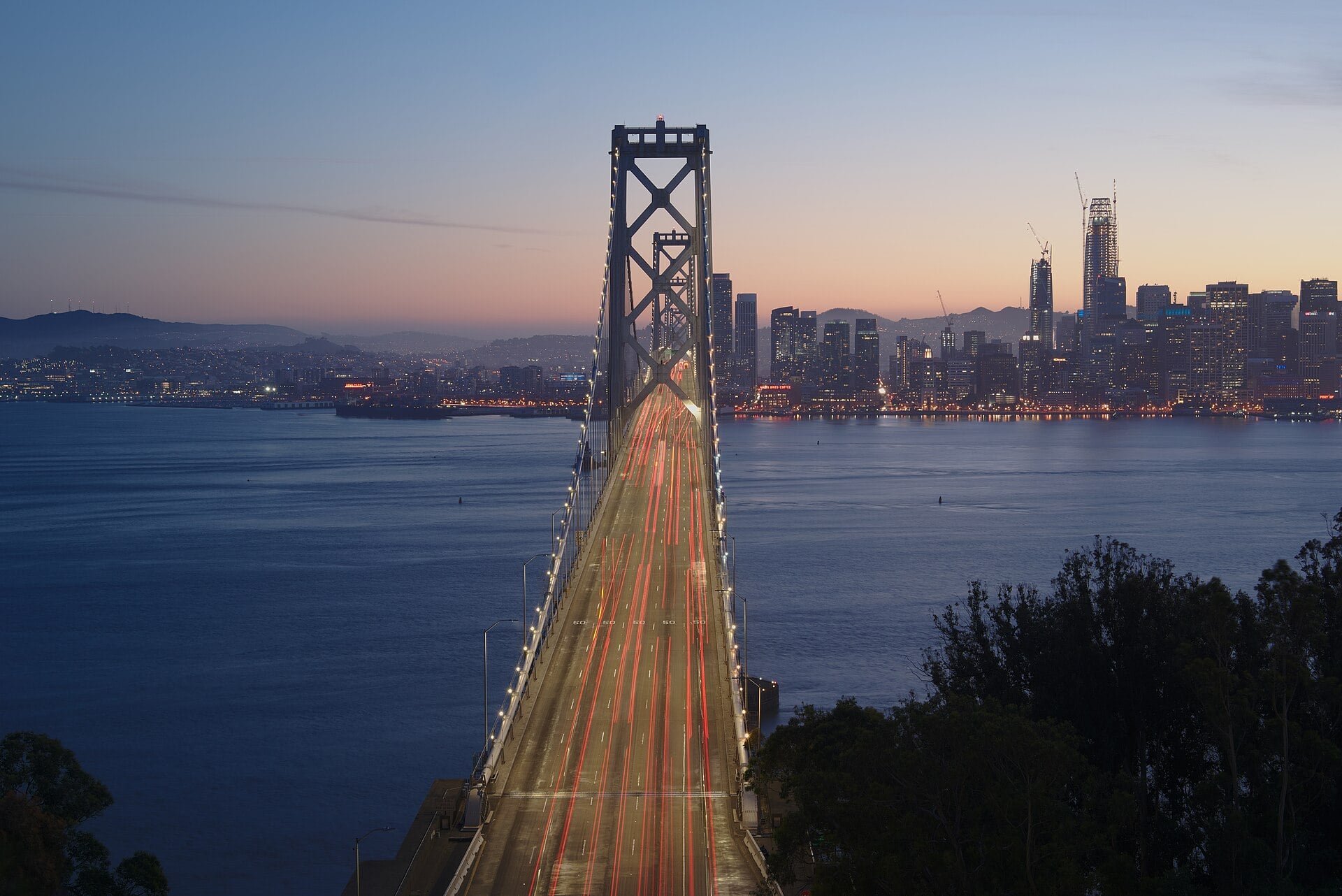 The San Francisco-Oakland Bay Bridge at dusk