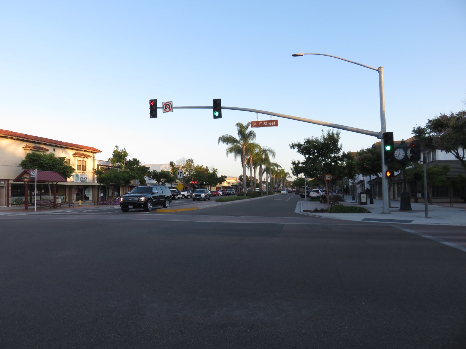 Street view of downtown Chula Vista, California, with curb space and traffic signals where California Movers USA plans the legal truck position