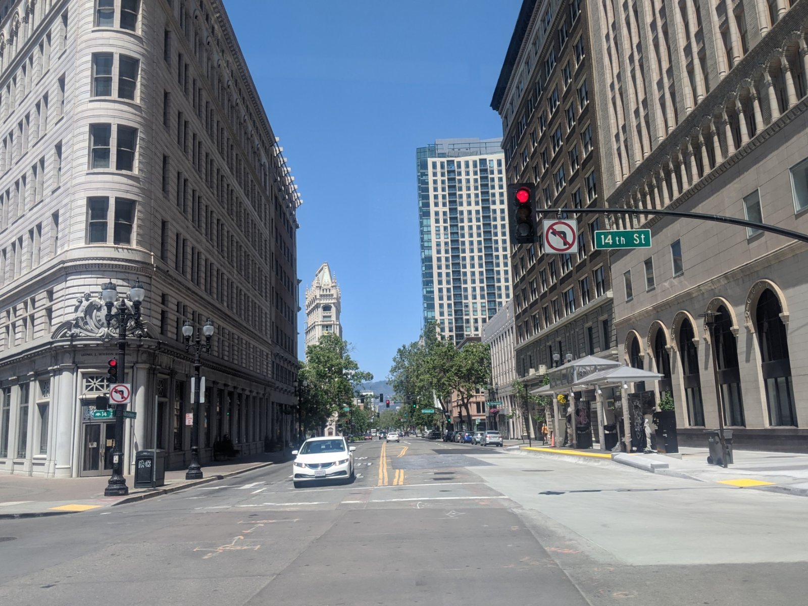 Broadway at 14th Street in downtown Oakland, California, where Halo California Movers confirms the curb, loading zone and building move window
