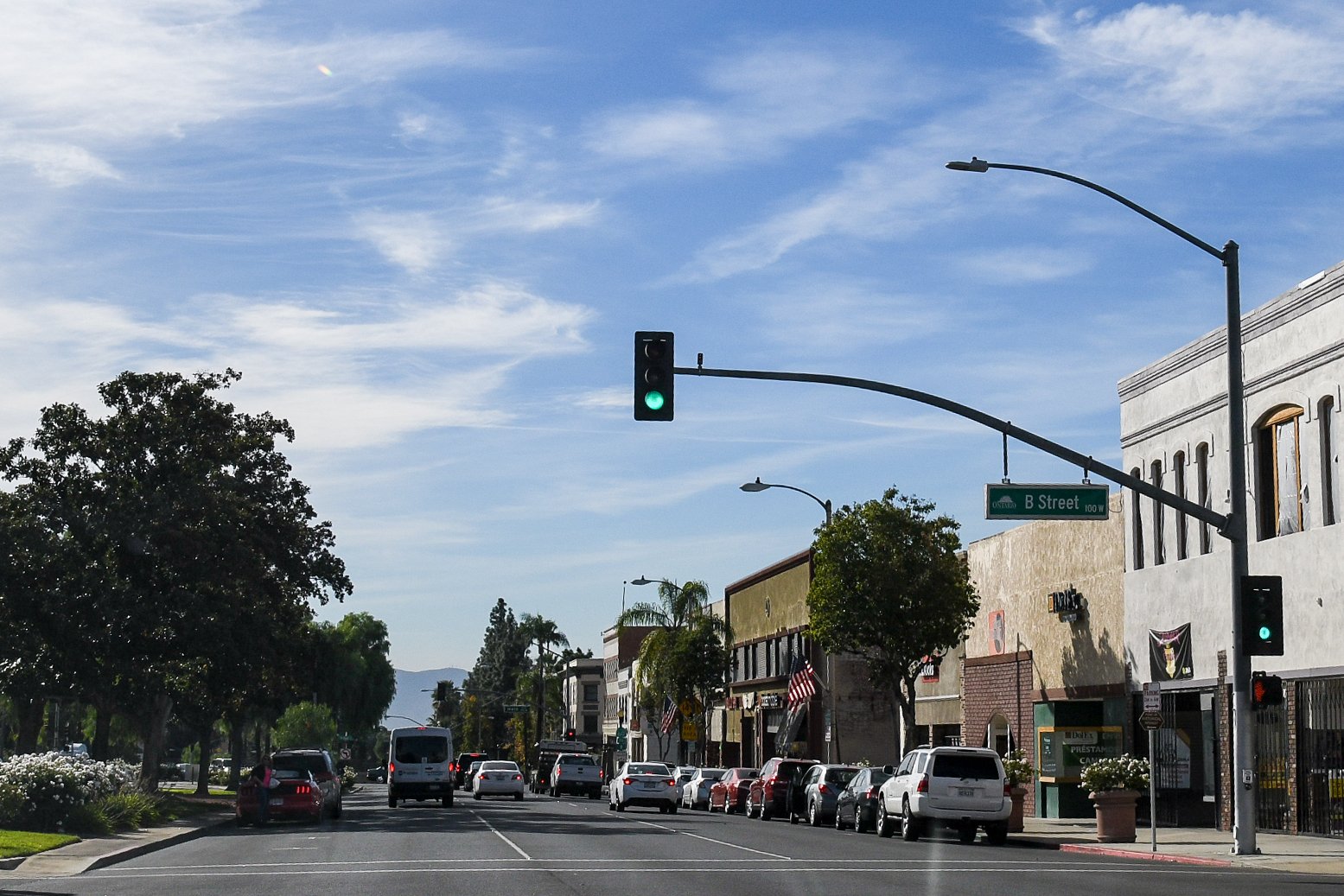 Downtown Ontario, California street with angled curb parking and storefronts where Halo California Movers confirms the loading point before a move