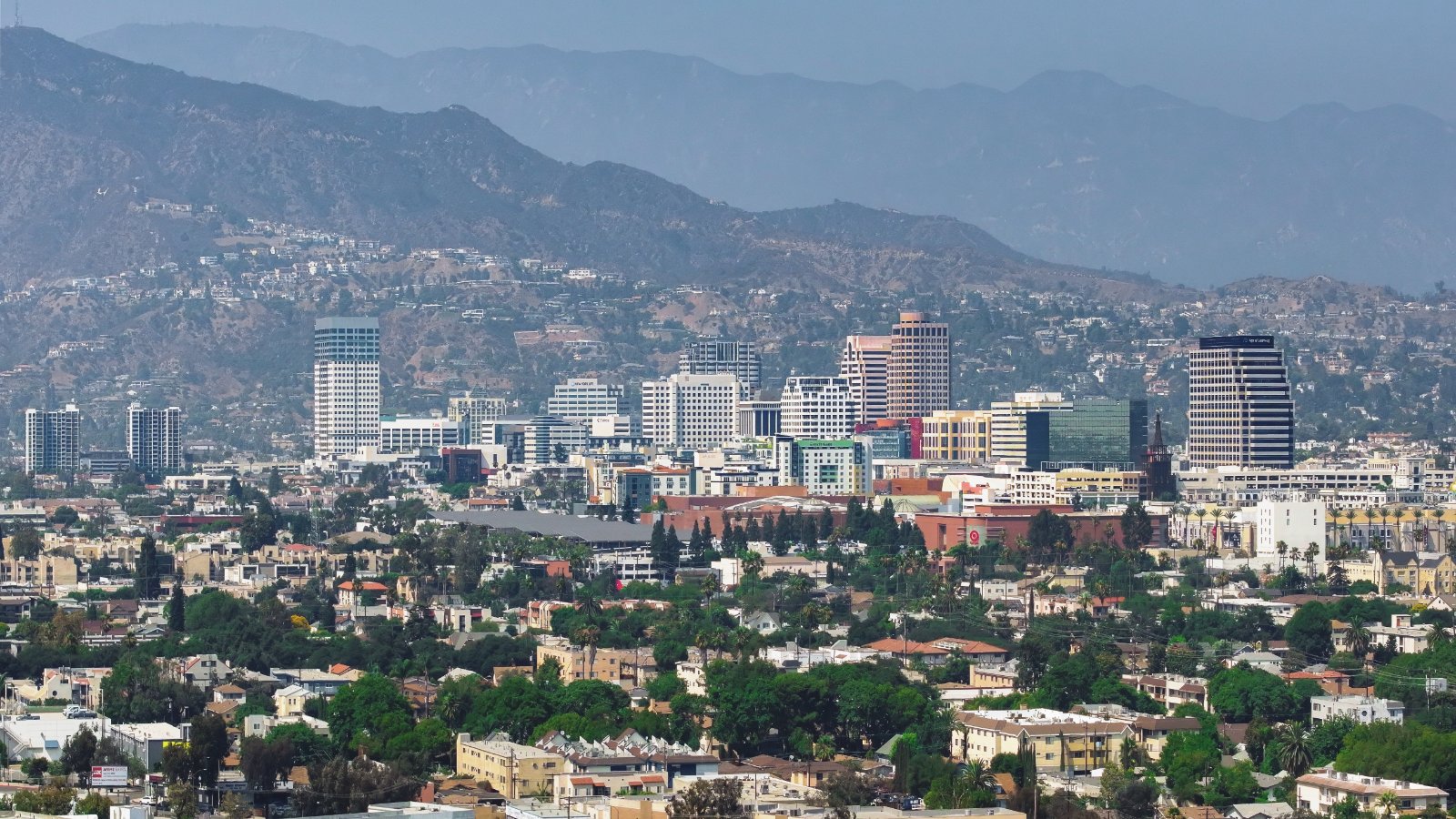 Glendale, California skyline with downtown buildings below the Verdugo foothills, where California Movers USA plans both apartment and hillside truck access