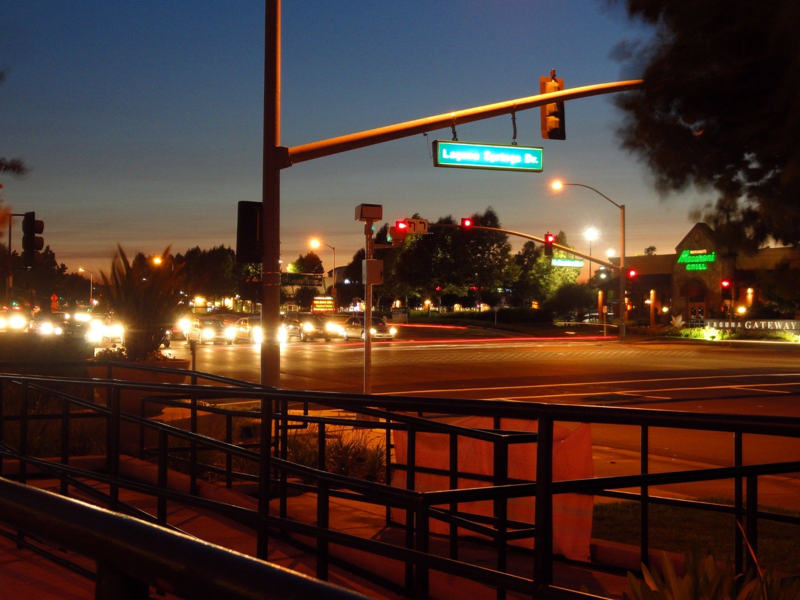 Wide suburban intersection at Laguna Springs Drive and Laguna Boulevard in Elk Grove, Sacramento County, California