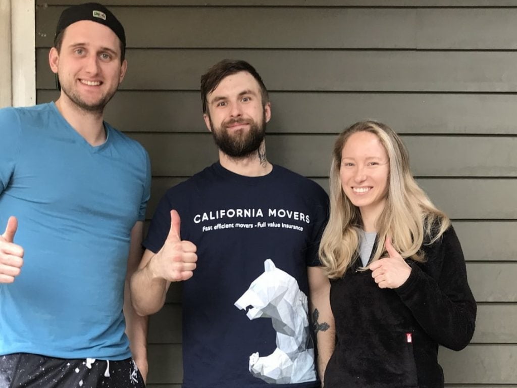 California Movers USA crew with a customer after a completed local move