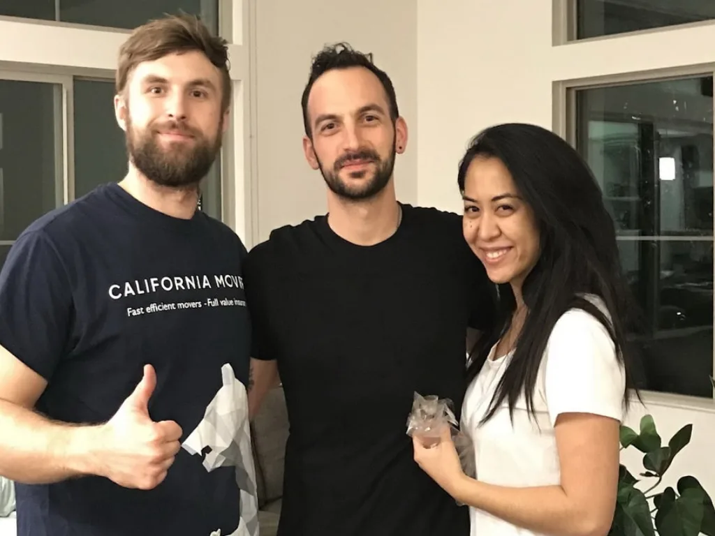 California Movers crew with a customer at the new home after a completed move