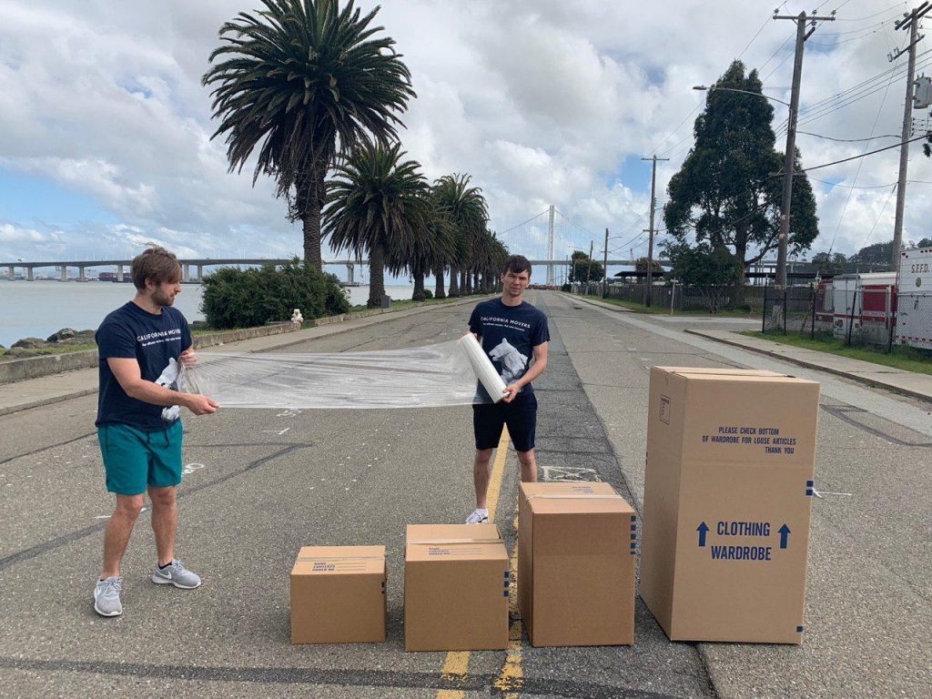 Packing services — Halo by California Movers USA Wardrobe boxes, cartons and packing materials supplied by Halo before a packing day