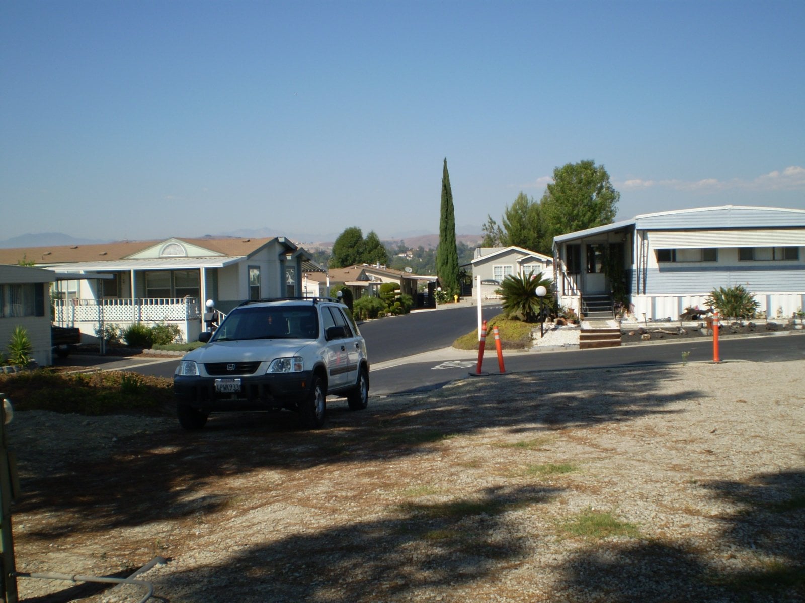 Residential street in West Covina, California, where California Movers USA plans truck position and carry path
